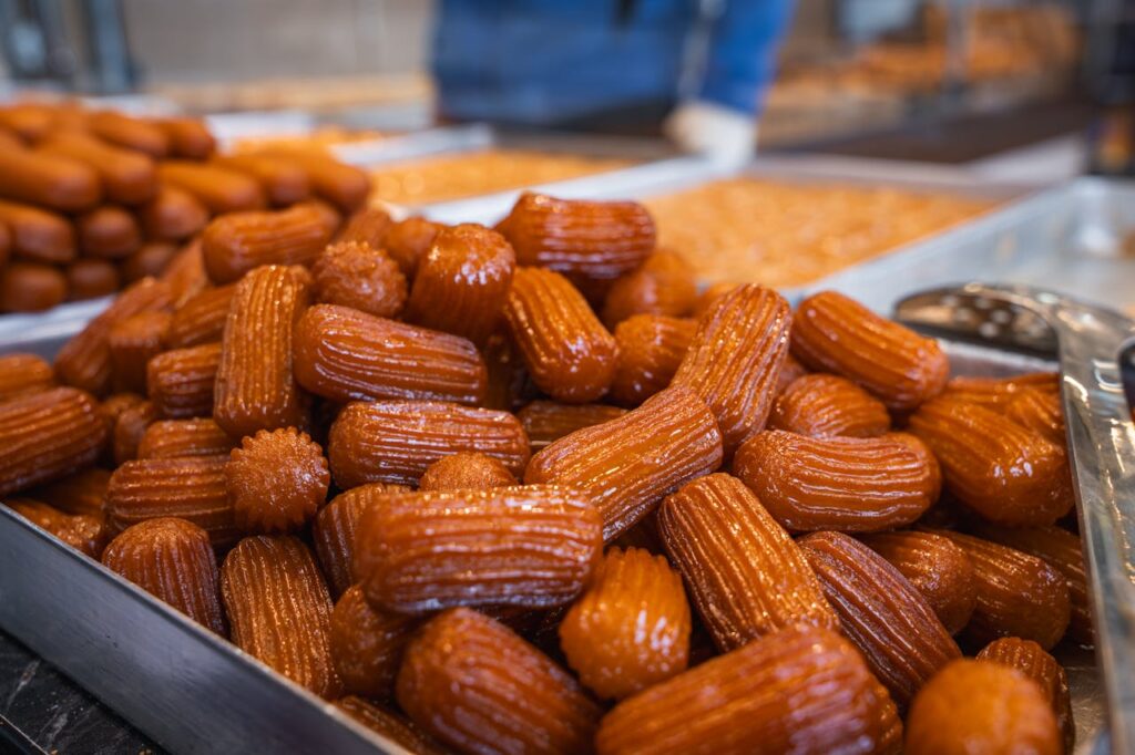 A delectable array of fresh Turkish desserts glistening in the market.
