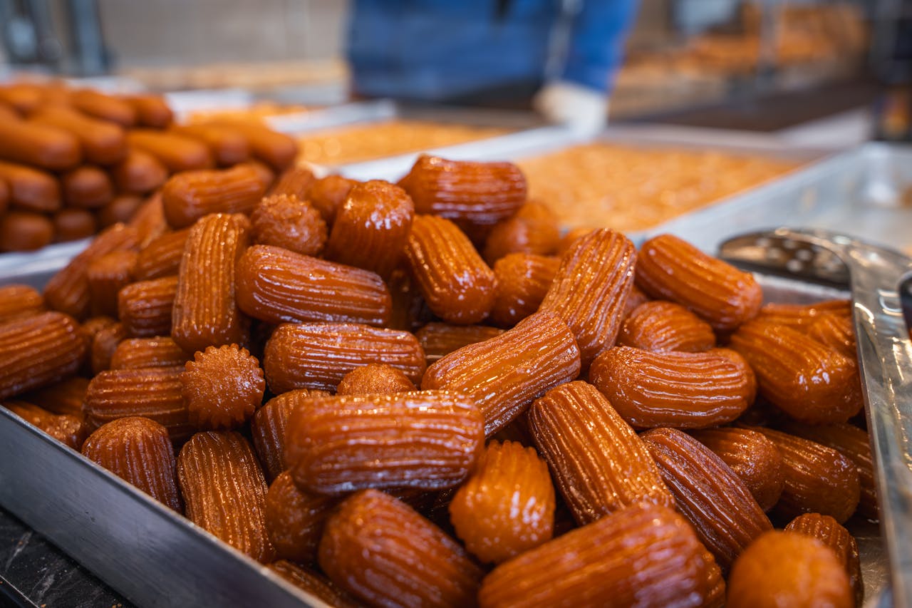 A delectable array of fresh Turkish desserts glistening in the market.